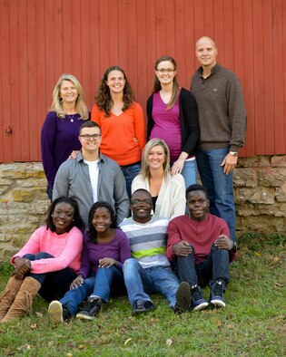Master Sgt. Frank Williams, a reservist with the 445th Aerospace Medicine Squadron, poses with his family. Williams and his wife, Kim, adopted four children from Africa to become a family of 10.