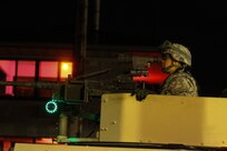 U.S. Army Reserve Spc. Diana Reyes, 319th Combat Sustainment Support Battalion, 79th Sustainment Support Command, watches a crew complete basic live-fire during Operation Cold Steel at Fort McCoy, Wis., March 28, 2017. Operation Cold Steel is the U.S. Army Reserve's crew-served weapons qualification and validation exercise to ensure that America's Army Reserve units and Soldiers are trained and ready to deploy on short-notice and bring combat-ready and lethal firepower in support of the Army and our joint partners anywhere in the world. (U.S. Army Reserve photo by Staff Sgt. Debralee Best, 84th Training Command)