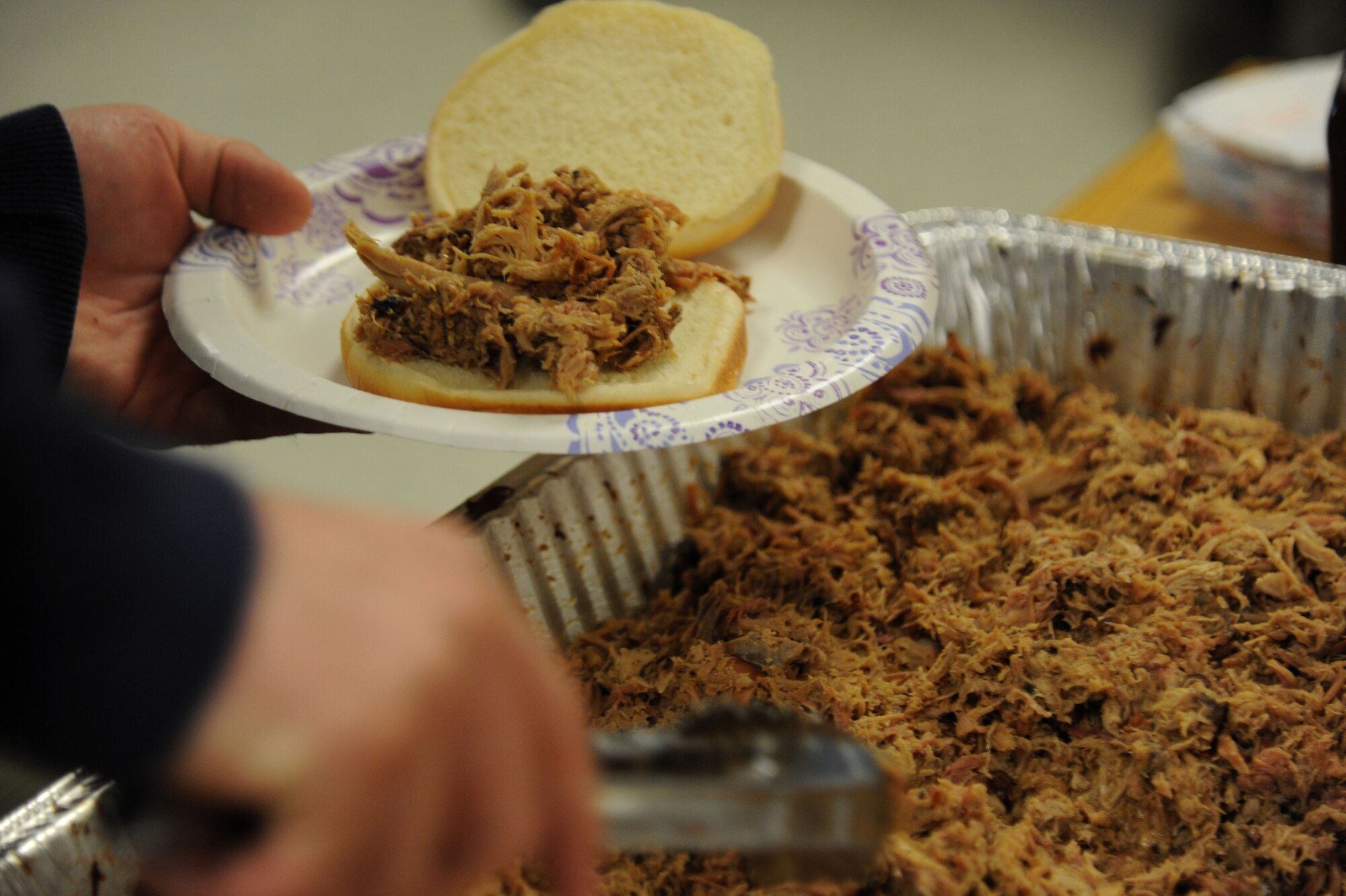 A free dinner is provided to Airmen March 10, 2017 at Crossroads Cafe on Little Rock Air Force Base. Units on base rotate and provide a meal for Airmen every other Friday of the month. (U.S. Air Force photo by Airman 1st Class Codie Collins)