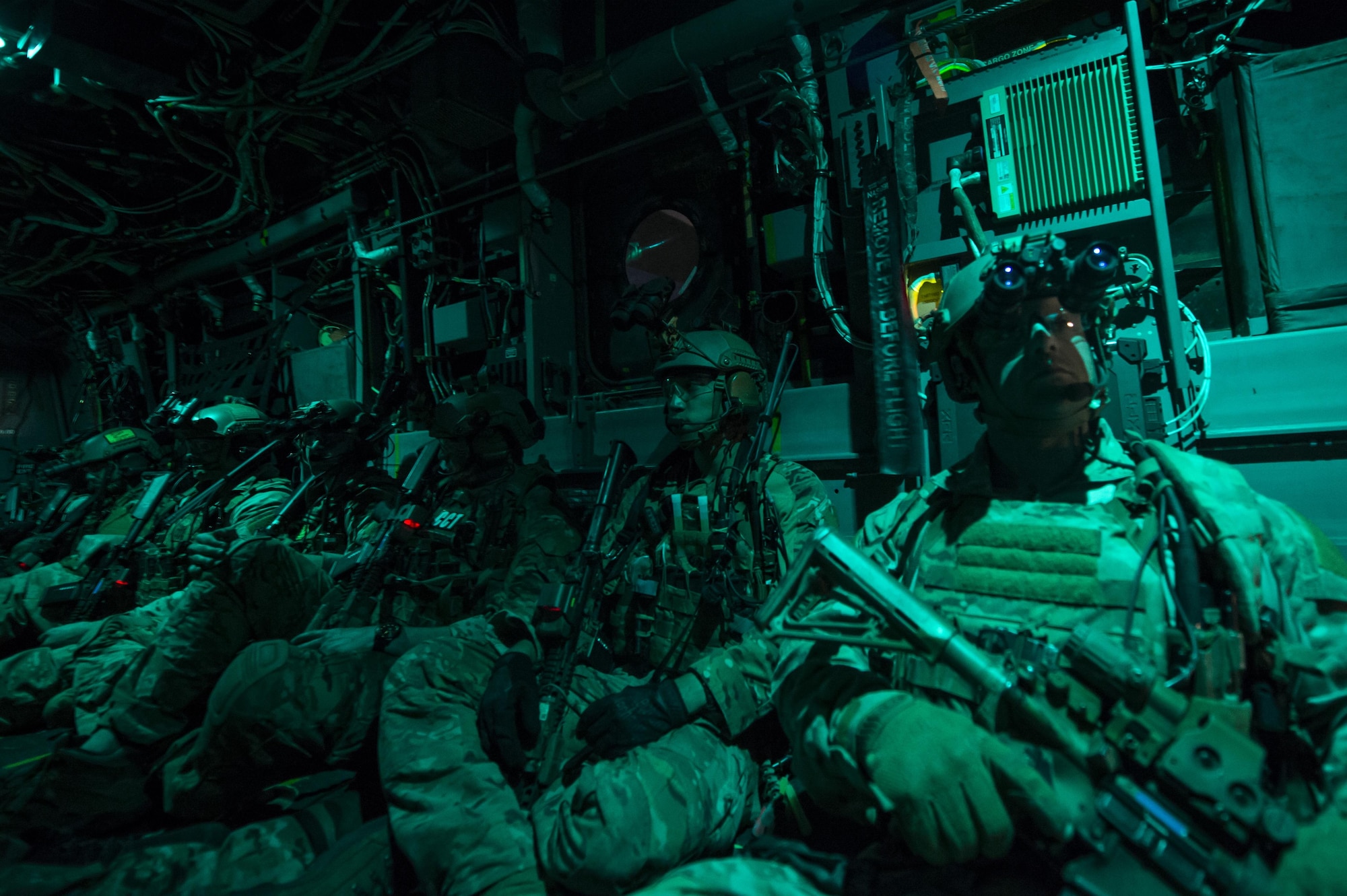 U.S. Air Force combat controllers from the 24th Special operations wing sit aboard a U.S. Air Force CV-22 Osprey at Avon Park, Fla., March 7th, 2017 during Emerald Warrior 17. Emerald Warrior is a U.S. Special Operations Command exercise during which joint special operations forces train to respond to various threats across the spectrum of conflict. (U.S. Air Force photo by Airman 1st Class Keifer Bowes)