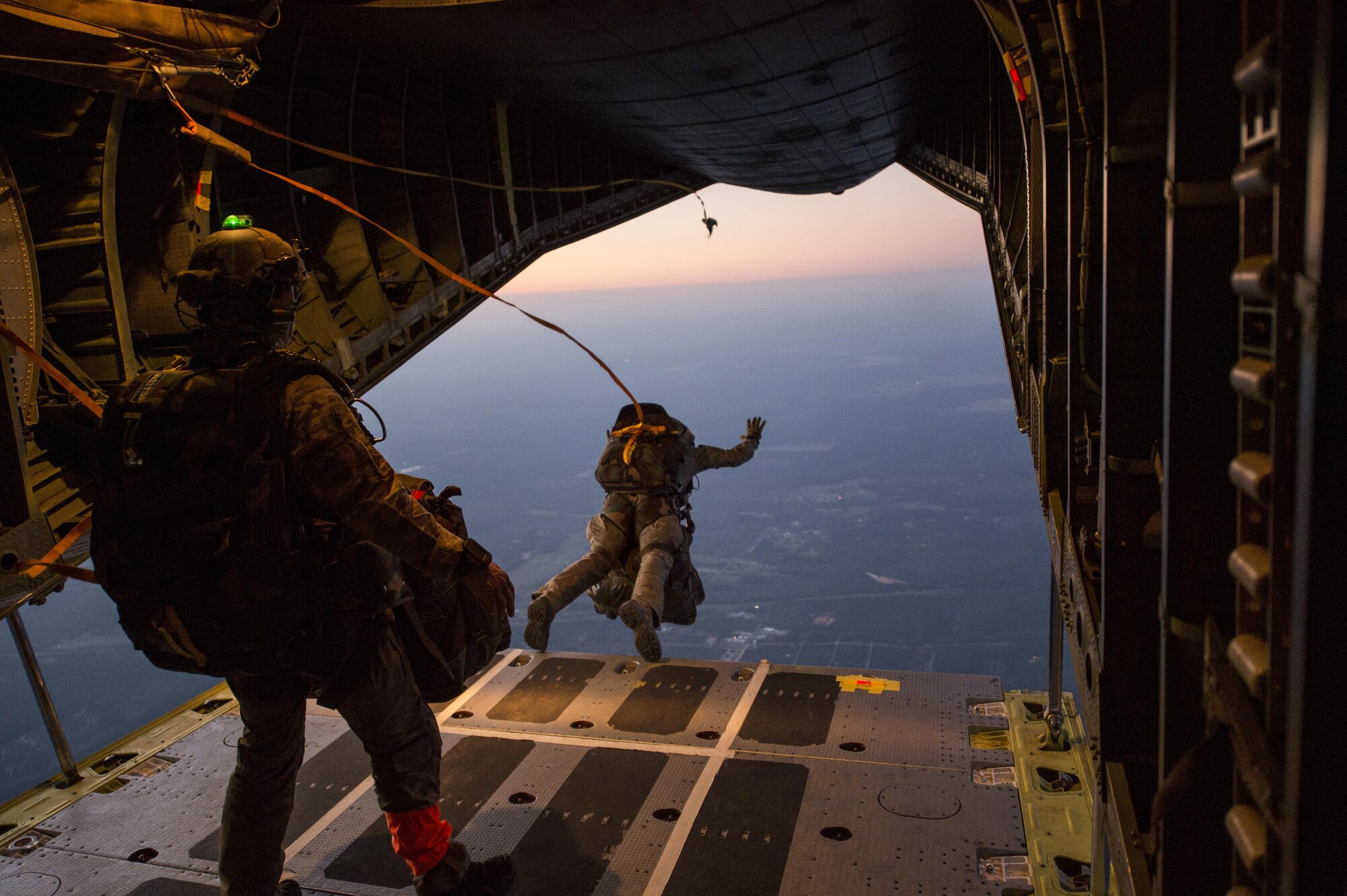 French air force special operations forces members perform a static-line jump during Emerald Warrior 2017 at Hurlburt Field, Fla., March 8, 2017. At Emerald Warrior, the largest joint special operations exercise, U.S. Special Operations Command forces train to respond to various threats across the spectrum of conflict. (U.S. Air Force photo by Staff Sgt. Douglas Ellis)
