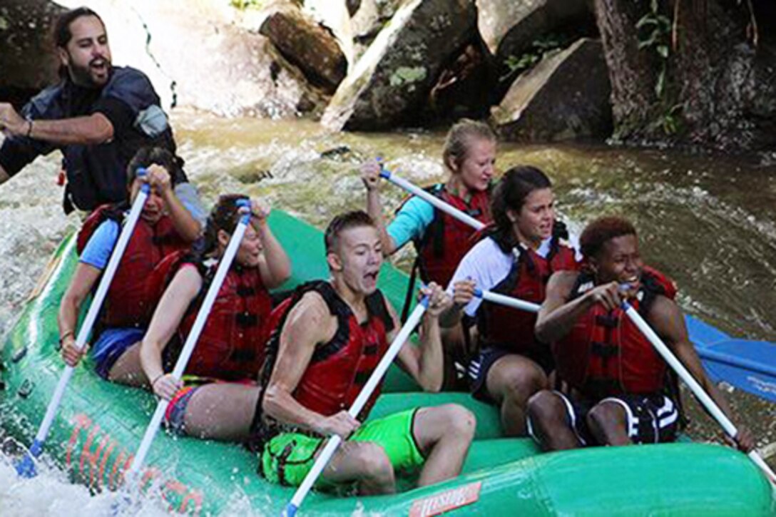 Military kids enjoy whitewater rafting at a military teen adventure camp. Photo courtesy Military Teen Adventure Camps