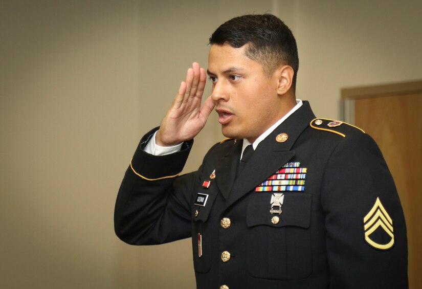 Army Reserve Staff Sgt. Erick Guzman, information technology staff noncommissioned officer, assigned to the 820th Signal Company, 98th Expeditionary Signal Battalion, 335th Signal Command (Theater), reports to the president of the board during an oral exam board at the command’s 2017 Best Warrior Competition held at Fort Huachuca, Arizona March 31.  After five-days of demanding physical and mental challenges Guzman was named the command’s Best Warrior for the noncommissioned officer ranks, and he will go on to represent the command at the U.S. Army Reserve Command’s Best Warrior Competition later this year.  (Official U.S. Army Reserve photo by Sgt. 1st Class Brent C. Powell)