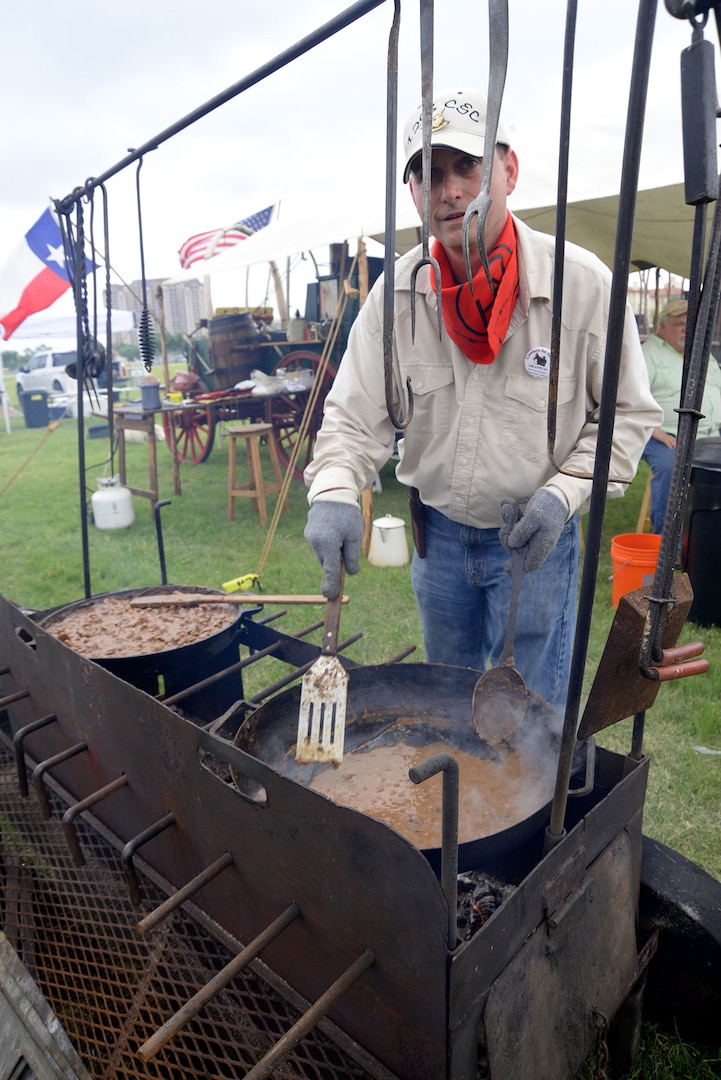 Andrew Robinson from 1298 Chuck Wagon prepares cowboy-style chili during the Cowboys for Heroes event Joint Base San Antonio-Fort Sam Houston’s MacArthur Parade Field April 1.