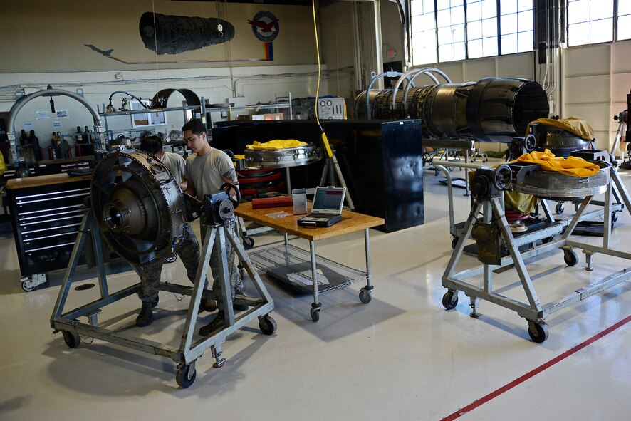 U.S. Air Force Senior Airman Jaymie Sanarez and Senior Airman Monhuan Lee, 20th Component Maintenance Squadron aerospace propulsion journeymen, prepare to work on a number three sump housing, which houses part of the F110-129D engine at Shaw Air Force Base, S.C., March 29, 2017. The number three sump housing will be part of one of the first 6,000 total accumulated cycle F110-129D engines that is scheduled to be built for the F-16CM Fighting Falcon. (U.S. Air Force photo by Airman 1st Class BrieAnna Stillman)