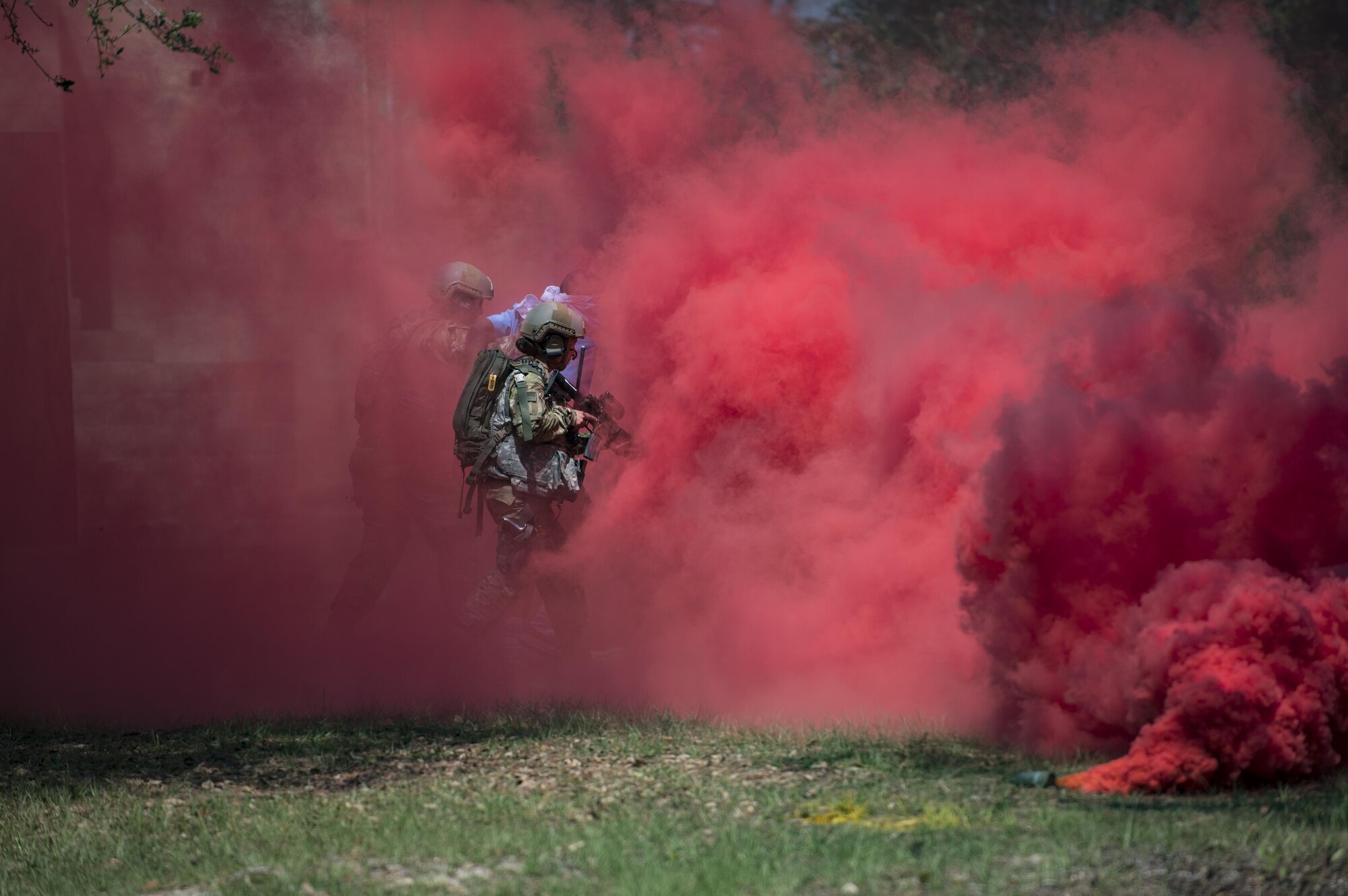Airmen from the 820th Base Defense Group escort a simulated enemy during a tactical demonstration, March 27, 2017, at Moody Air Force Base, Ga. The demonstration was part of the 820th BDG anniversary, which commemorated 20 years since the activation of the 820th BDG and allowed guests to reminisce on their history, honor those they’ve lost, and witness a tactical demonstration. (U.S. Air Force photo by Airman 1st Class Daniel Snider)