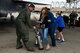 Lt. Col. Stephen Taylor, 334th Fighter Squadron assistant director of operations, receives the traditional 
“fini flight” ritual from his wife and three children after completing his final flight in the F-15E Strike Eagle, March 30, 2017, at Seymour Johnson Air Force Base, North Carolina. Taylor retires from the Air Force in June 2017 after more than 18 years as a weapon systems officer. (U.S. Air Force photo by Airman 1st Class Victoria Boyton) 
