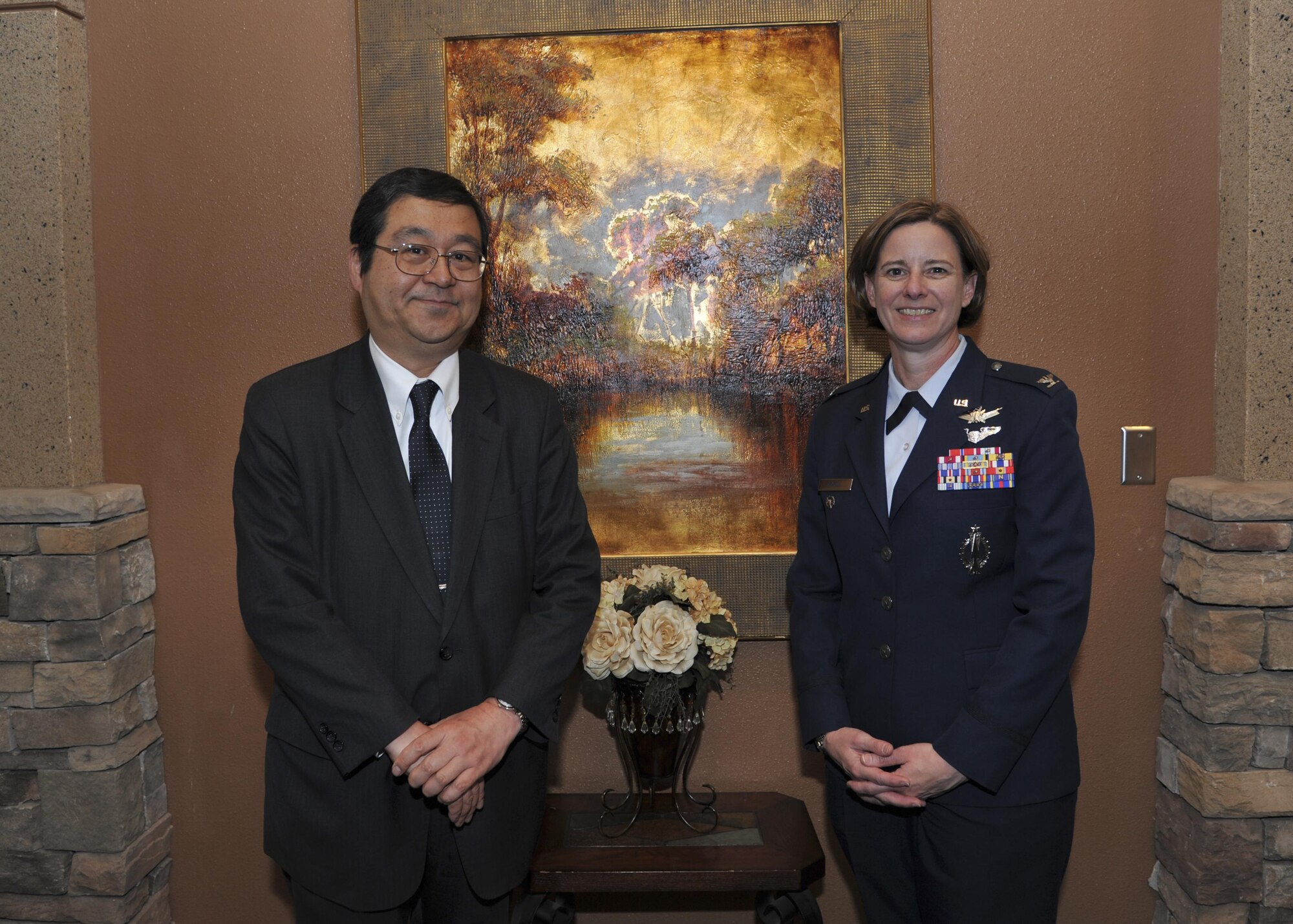 Consul-General of Japan Hiroto Hirakoba poses with Col. Dawn Nickel, 377th Air Base Wing vice commander, during the Consul-General of Japan lunch reception at the Mountain View Club on Kirtland Air Force Base March 31. Hirakoba offered praise and thanks to personnel during the event for helping strengthen the joint forces relationship between the United States and Japan. 