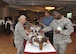 Base personnel eat Japanese and New Mexican food during the Consul-General of Japan lunch reception at the Mountain View Club on Kirtland Air Force Base March 31. The lunch reception was a joint event hosted by the Consul-General of Japan and the 377th Air Base Wing with the purpose of strengthening ties and building dialogue between the Japanese Consulate General and U.S. military officers enlisted members, civil servants and their families. 