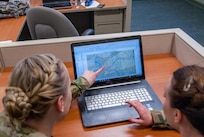 Sgt. Morgan T. Wilken identifies a location in ArcMap at the 301st Maneuver Enhancement Brigade headquarters, Joint Base Lewis-McChord, Washington, Feburary 12, 2017. Geospatial engineers produce the maps that will support the commander’s next mission, and are a vital component of the Army, Army Reserve, and Total Force (U.S. Army Reserve photo by Spc. Sean Harding/Released).