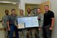 U.S. Air Force Senior Airman Jefferey N. Sales, II, 20th Security Forces Squadron visitor control center clerk, receives the Shaw Chief’s Group Spring Scholarship at Shaw Air Force Base, S.C., April 3, 2017. The Shaw Chief’s Group awarded Sales the scholarship for his essay about joining the military and his current goals. (U.S. Air Force photo by Airman 1st Class Destinee Sweeney)