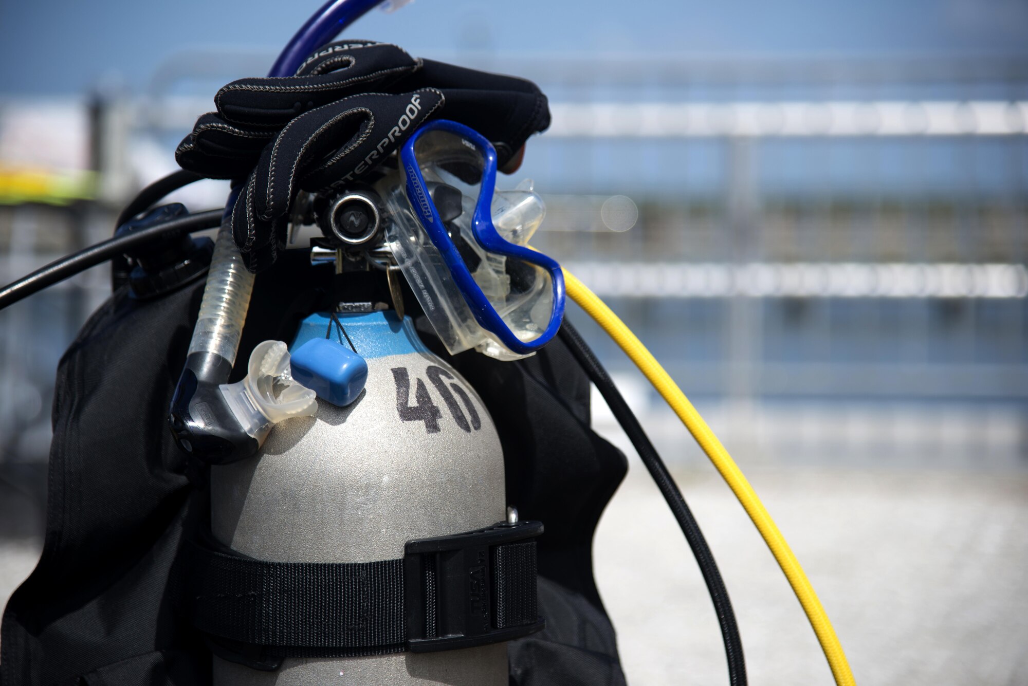 More than 30 civilians and service members come together to clean up debris from the water surrounding MacDill Air Force Base, Fla., March 26, 2017. After a short safety brief, divers split into teams to survey the area for trash and debris. (U.S. Air Force photo by Airman 1st Class Rito Smith)