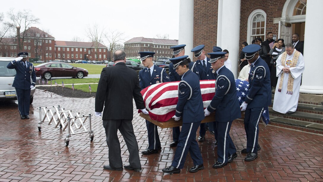 A Dover Air Force Base Honor Guard team carries the remains of retired Maj. John L. Harrison, Jr., World War II veteran and Tuskegee Airman, during his funeral service March 31, 2017, at the Chapel of the Four Chaplains at the Navy Yard in Philadelphia, Pa. Harrison died at the age of 96 on March 22, 2017. (U.S. Air Force photo by Senior Airman Zachary Cacicia)