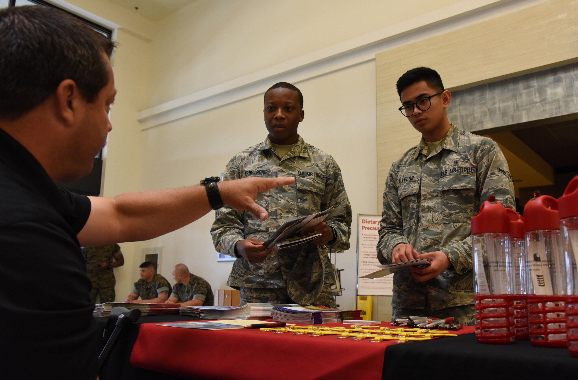 David Blair, University of Alabama veteran and military affairs director, provides information to Airmen Khalil Armstrong and Kiven Alfelor, 81st Medical Support Squadron medical logistics technicians, during the Spring Education Information Fair at the base exchange, March 29, 2017, on Keesler Air Force Base, Miss. The Keesler Education Services’ staff hosted more than 25 community colleges and universities at the event. (U.S. Air Force photo by Kemberly Groue)