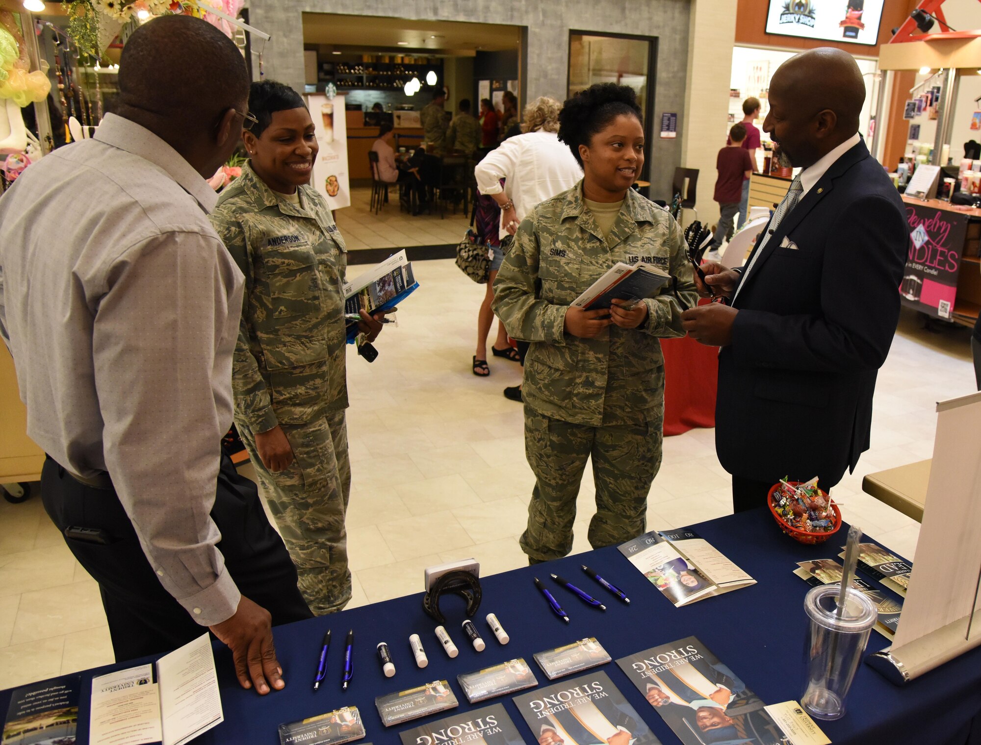 Keesler personnel attend the Spring Education Information Fair at the base exchange, March 29, 2017, on Keesler Air Force Base, Miss. The event is held to allow Keesler personnel the opportunity to explore higher education options. (U.S. Air Force photo by Kemberly Groue)