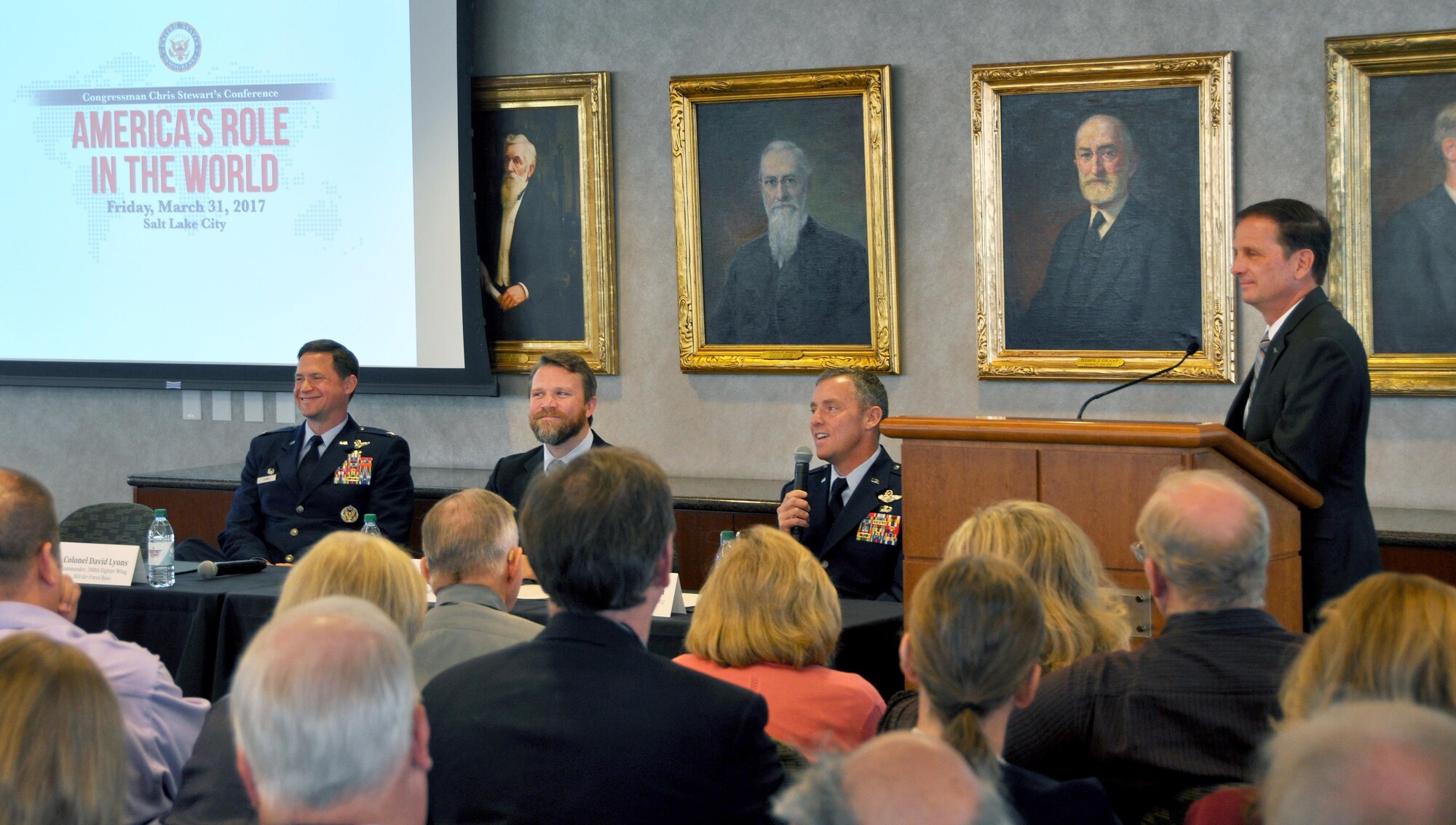 Col. David Smith (center), 419th Fighter Wing commander, and Col. David Lyons (left), 388th FW commander, speak during a national security conference hosted by Rep. Chris Stewart (right) in Salt Lake City March 31. The commanders joined Philip Lohaus, research fellow at American Enterprise Institute, for a panel discussion on the F-35 Lightning II, the Air Force’s newest fighter jet. (U.S. Air Force photo/Bryan Magaña)