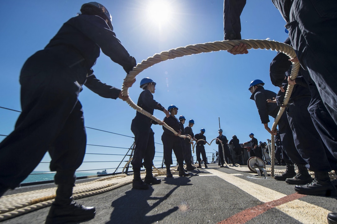 Sailors stow mooring lines aboard the USS Ross as the ship departs Naval Station Rota, Spain, April 3, 2017. The Ross is conducting naval operations in the U.S. 6th Fleet area of operations to support U.S. national security interests in Europe and Africa. Navy photo by Petty Officer 3rd Class Robert S. Price