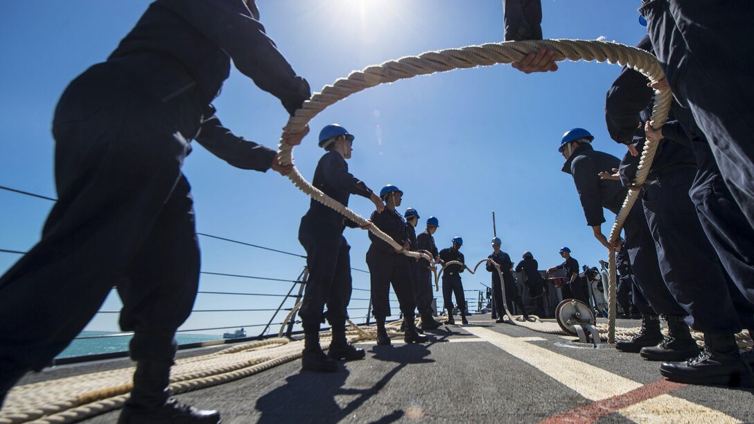 Sailors stow mooring lines aboard the USS Ross as the ship departs Naval Station Rota, Spain, April 3, 2017. The Ross is conducting naval operations in the U.S. 6th Fleet area of operations to support U.S. national security interests in Europe and Africa. Navy photo by Petty Officer 3rd Class Robert S. Price