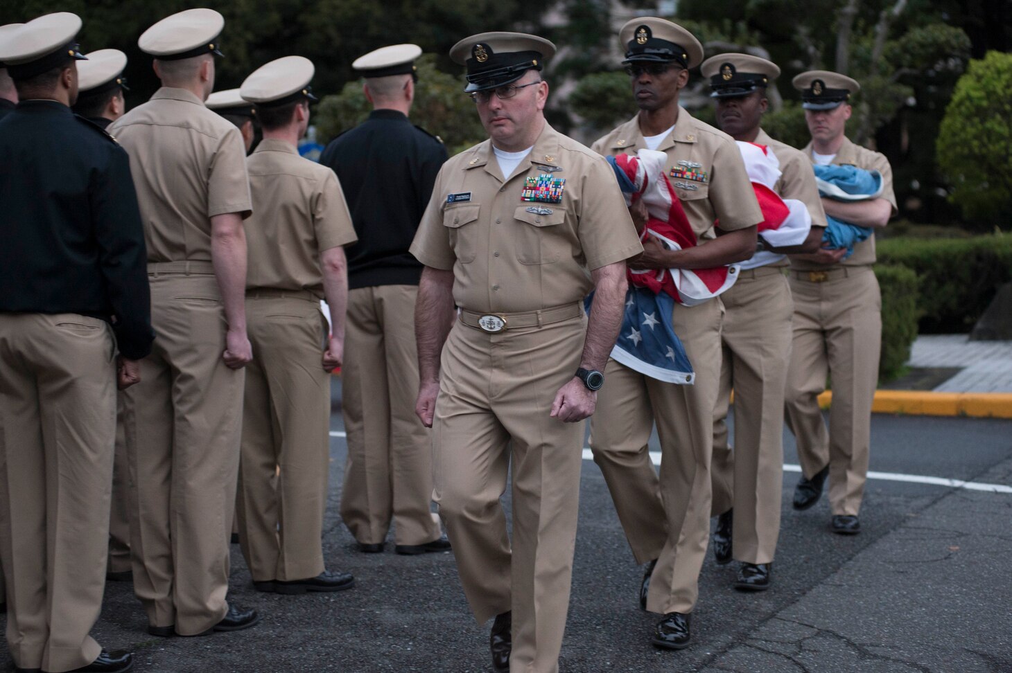 YOKOSUKA, Japan (April 1, 2017) During evening colors Chief Petty Officers from U.S. 7th Fleet and USS Blue Ridge (LCC 19) honor fallen Chiefs on the day of the 124th birthday of the Chief Petty Officers rank. The rank of chief petty officer was established on April 1, 1893. (U.S. Navy photo by Mass Communication Specialist 2nd Class Leonard Adams/Released)