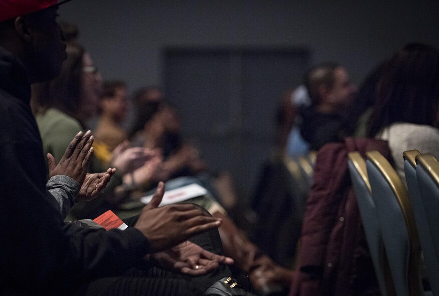 The audience claps during the performance of, “Jesus Hopped The ‘A’ Train,” March 29, 2017, at Yokota Air Base, Japan. Over 120 members of Yokota participated in the event. (U.S. Air Force photo by Airman 1st Class Donald Hudson)