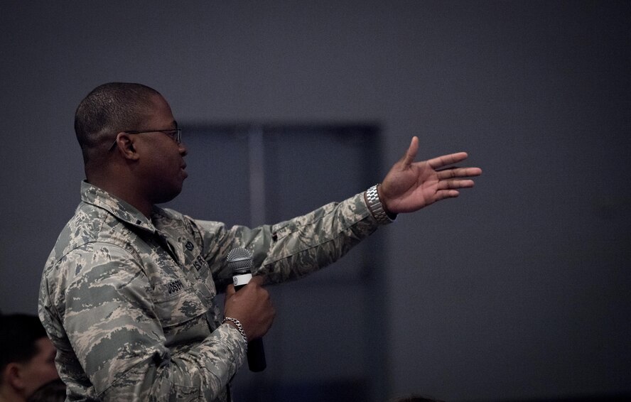 Military member asks actors a question after the performance of, “Jesus Hopped The ‘A’ Train,” March 20, 2017, at Yokota Air Base, Japan. The performance was brought to Yokota by the Arts in the Armed Forces, an organization who providing free theatre programming for active duty service members, veterans and their families. (U.S. Air Force photo by Airman 1st Class Donald Hudson)
