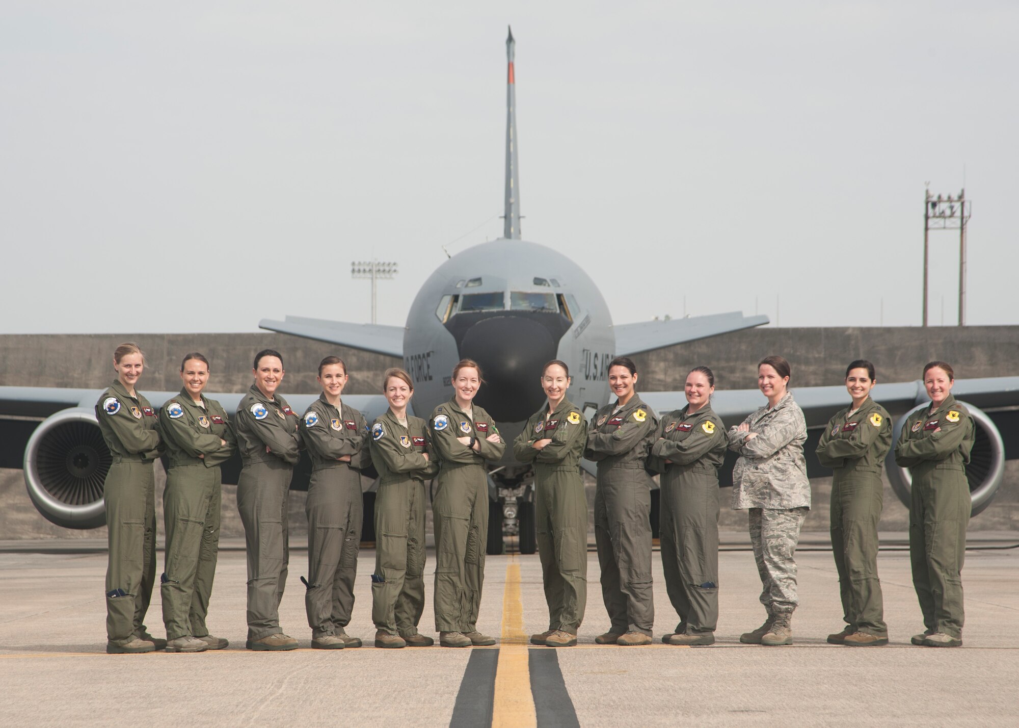 U.S. Air Force aircrew members from the 909th Air Refueling Squadron stand in front of a KC-135 Stratotanker March 30, 2017, at Kadena Air Base, Japan. The 909th ARS has one of the largest all female aircrews in the Air Force with a total of 13 active members.(U.S. Air Force photo by Airman 1st Class Quay Drawdy/Released)