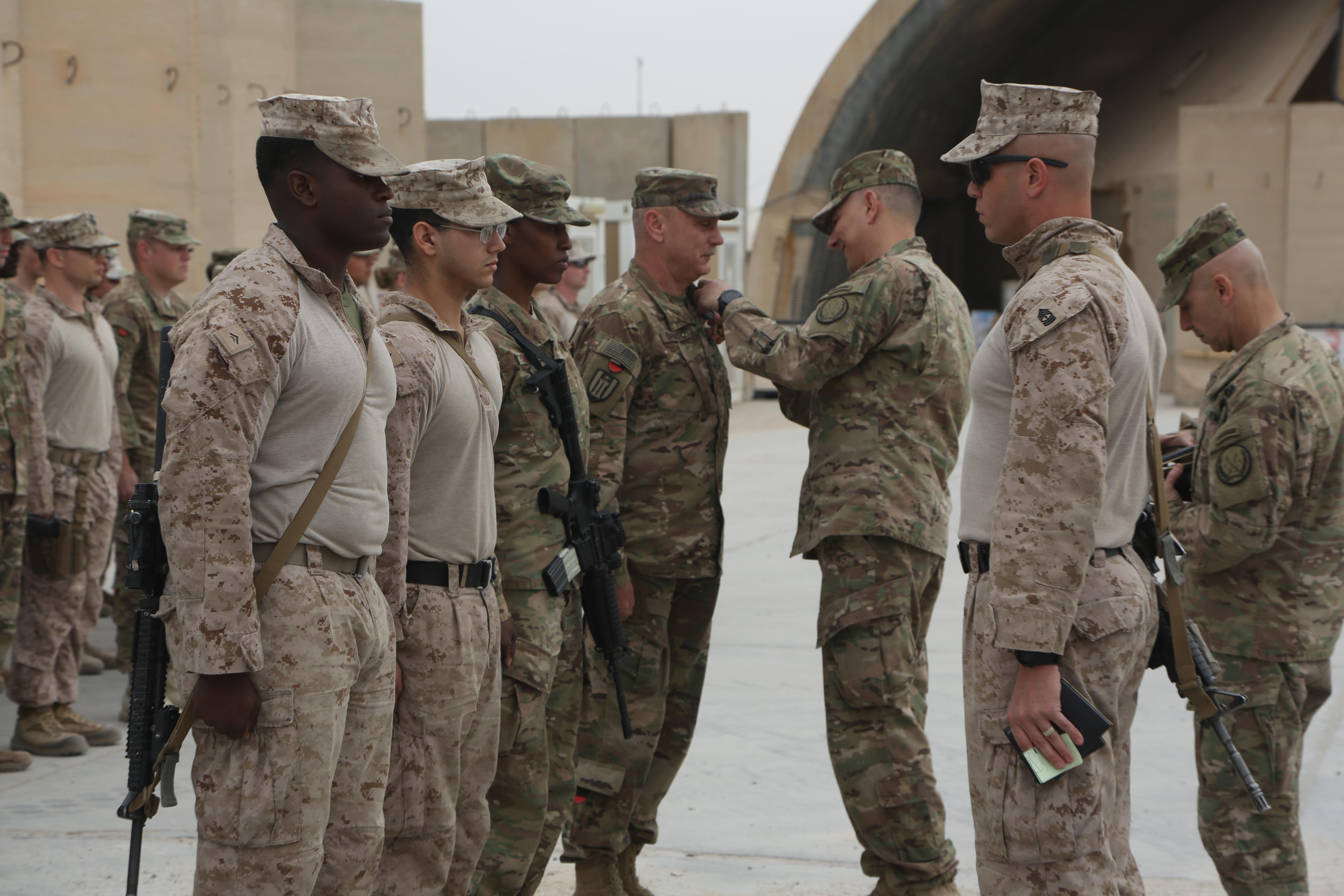Cjtf Commanding General Presents Marines Soldiers Awards