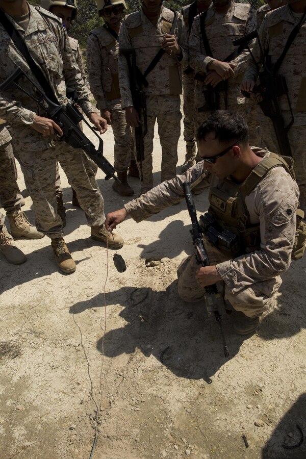 Staff Sgt. John Williams, the platoon sergeant of Weapons Company, 3rd Battalion, 7th Marine Regiment, Special Purpose Marine Air-Ground Task Force-Crisis Response-Central Command, reveals a notional improvised explosive device during counter-IED training in Saudi Arabia, March 7, 2017. The training proved to be an enhancing opportunity for both the U.S. and Saudi Marines. Deploying U.S. Marines into the U.S. Central Command area of responsibility to conduct combined military training with our partner nations’ security forces strengthens our vital relationships with partners in this important region. (U.S. Marine Corps photo by Cpl. Christopher Thompson) 