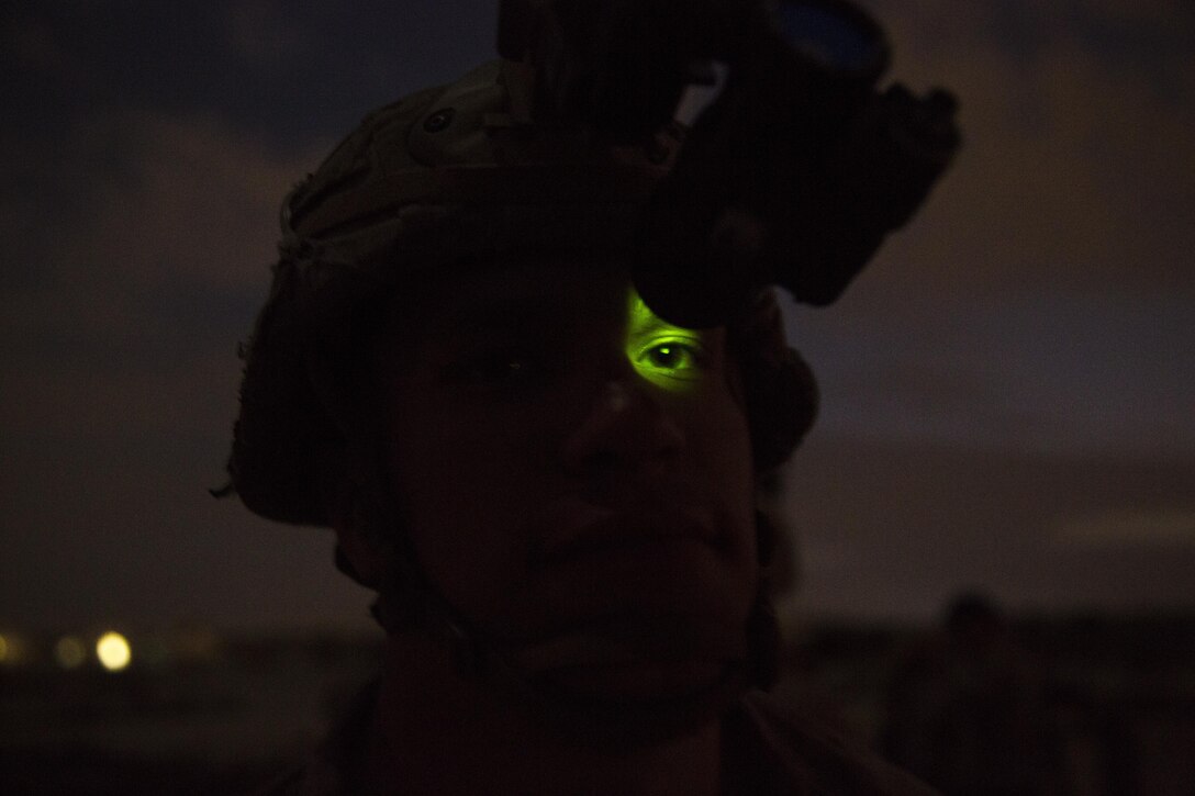 Cpl. Philip Kline, a scout sniper with Weapons Company, 3rd Battalion, 7th Marine Regiment, Special Purpose Marine Air-Ground Task Force-Crisis Response-Central Command, leads the Marines of the Royal Saudi Naval Forces to test PVS-14 monocular night vision devices in Saudi Arabia, March 8, 2017. The training proved to be an enhancing opportunity for both the U.S. and Saudi Marines. Deploying U.S. Marines into the U.S. Central Command area of responsibility to conduct combined military training with our partner nations’ security forces strengthens our vital relationships with partners in this important region. (U.S. Marine Corps photo by Cpl. Christopher Thompson) 