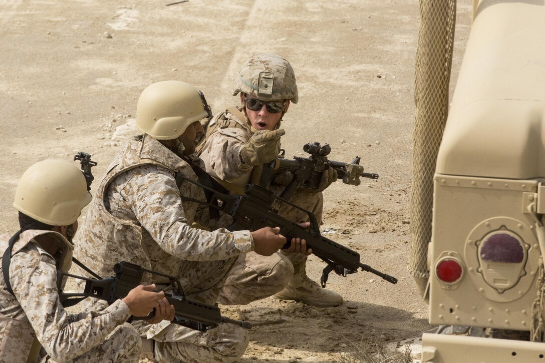 Lance Cpl. William Hatley, a mortarman with Weapons Company, 3rd Battalion, 7th Marine Regiment, Special Purpose Marine Air-Ground Task Force-Crisis Response-Central Command, trains with the Marines of the Royal Saudi Naval Forces to provide notional suppression fire for the assault force during a raid training exercise in Saudi Arabia, March 9, 2017. The training proved to be an enhancing opportunity for both the U.S. and Saudi Marines. Deploying U.S. Marines into the U.S. Central Command area of responsibility to conduct combined military training with our partner nations’ security forces strengthens our vital relationships with partners in this important region. (U.S. Marine Corps photo by Cpl. Christopher Thompson) 
