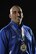 U.S. Air Force Tech. Sgt. Michael Christiansen, 100th Security Forces Squadron assistant flight chief, poses with a medal he won during the Air Force Trials at Nellis Air Force Base, Nev., for sitting volleyball March 28, 2017, on RAF Mildenhall, England. Christiansen was selected to represent U.S. Air Forces in Europe at the 2017 Department of Defense Warrior Games in Chicago where he will compete in the rifle, pistol, recurve archery and sitting volleyball events. (U.S. Air Force photo by Staff Sgt. Micaiah Anthony)