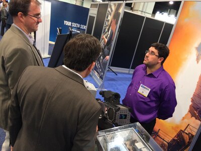 Mr Cameron Sorlie discusses aspects of NSWC Dahlgren Division's Directed Energy program with symposium visitors. Dahlgren engineers took part in the Navy League's Sea, Air and Space Symposium 2017, April 2-5, at the National Harbor in Washington, D.C. The Navy League's Sea-Air-Space Exposition brings the U.S. defense industrial base, private-sector U.S. companies and key military decision makers together for an annual innovative, educational, professional and maritime based event.