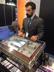 Mr. Kurt Miller discusses with visitors a model of a NSWC Dahlgren Division developed system used in the defense against chemical attack. Dahlgren engineers took part in the Navy League's Sea, Air and Space Symposium 2017, April 2-5, at the National Harbor in Washington, D.C. The Navy League's Sea-Air-Space Exposition brings the U.S. defense industrial base, private-sector U.S. companies and key military decision makers together for an annual innovative, educational, professional and maritime based event. 
