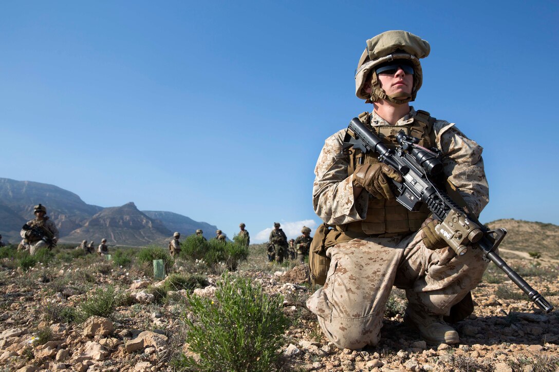 Marine Corps Lance Cpl Adam J. Jenkins, foreground, waits to move out with his team and Spanish soldiers during a bilateral urban terrain exercise in Alicante, Spain, March 29, 2017. Jenkins is an anti-tank missileman assigned to Special Purpose Marine Air Ground Task Force-Crisis Response-Africa. Marine Corps photo by Sgt. Jessika Braden 