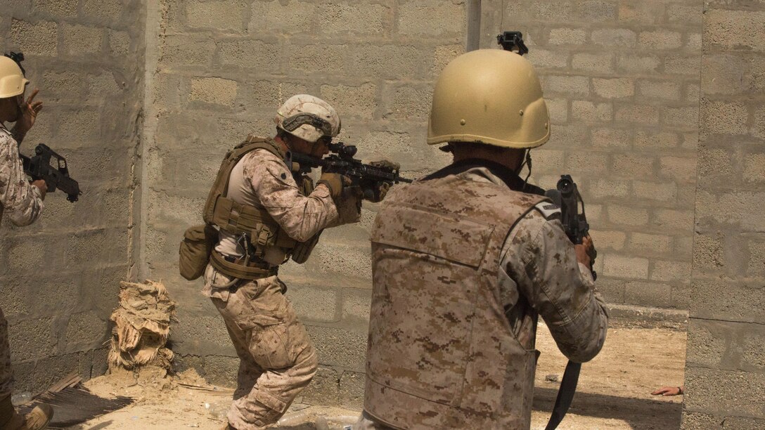 Staff Sgt. John Williams, the platoon sergeant of Weapons Company, 3rd Battalion, 7th Marine Regiment, Special Purpose Marine Air-Ground Task Force-Crisis Response-Central Command, and Marines with the Royal Saudi Naval Forces, clear rooms during a squad attack exercise in Saudi Arabia, March 9, 2017. The training proved to be an enhancing opportunity for both the U.S. and Saudi Marines. Deploying U.S. Marines into the U.S. Central Command area of responsibility to conduct combined military training with our partner nations’ security forces strengthens our vital relationships with partners in this important region. 