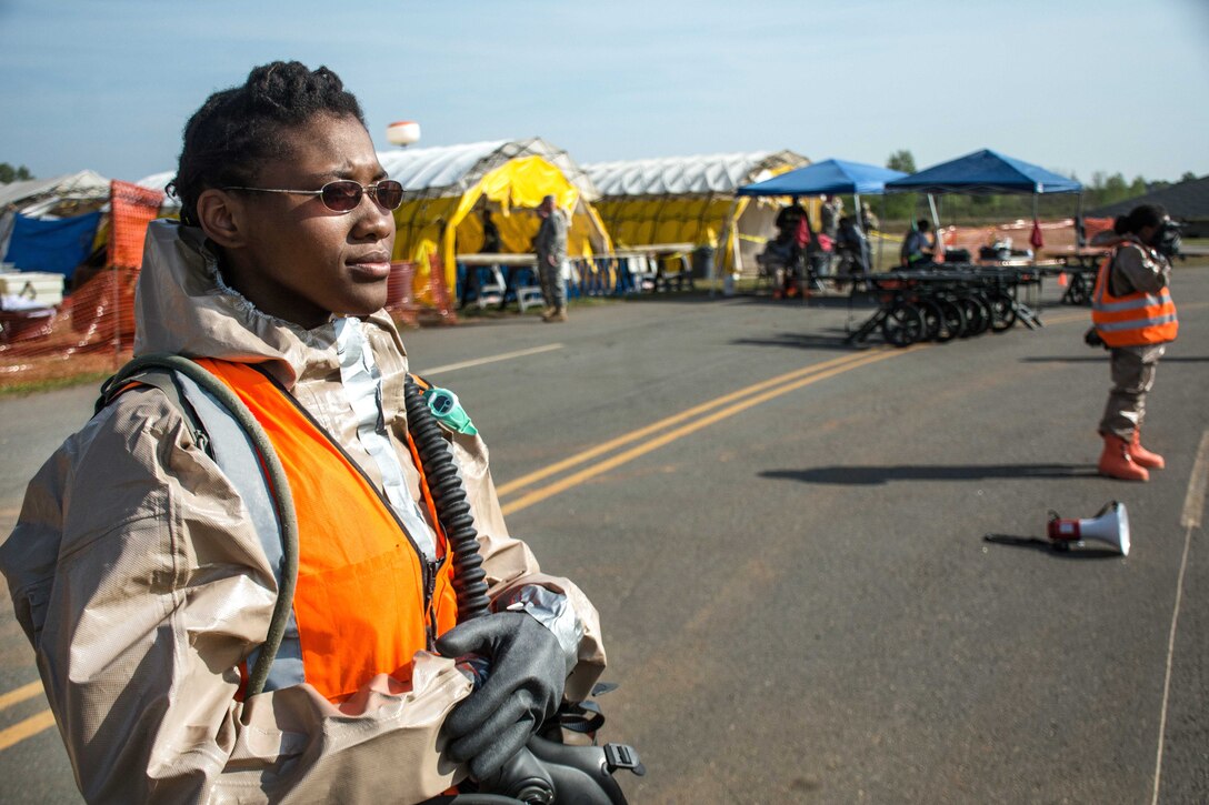 Georgia Army National Guard Spc. Dianna Anthoney conducts perimeter security during Operation Vigilant Guard at the Guardian Center in Perry, Georgia, March 29, 2017. Anthoney is assigned to the Georgia National Guard’s 138th Chemical Company, Casualty Assist Support Element. The exercise provides National Guard units with the opportunity to improve on cooperation and relationships with not only local and state agencies but military and federal partners as well to insure proper preparation for emergencies and catastrophic events. Army photo by Pfc. Darion Gibson 