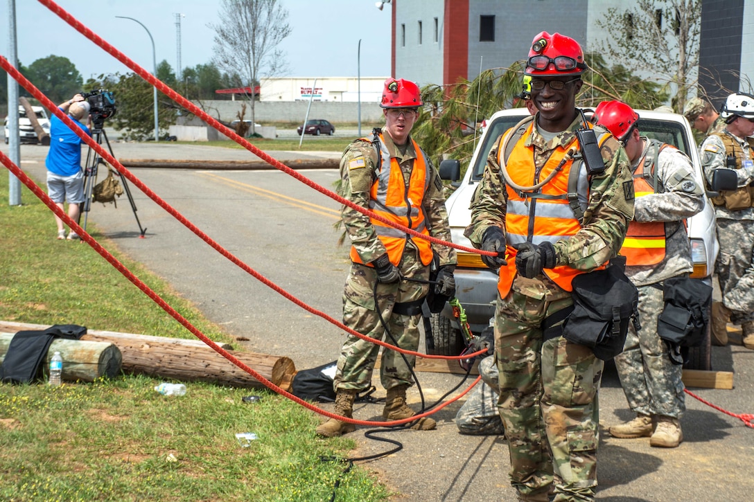 Georgia Army National Guard members create a makeshift pulley system to move a mock casualty during Operation Vigilant Guard at the Guardian Center in Perry, Georgia, March 29, 2017. Army photo by Pfc. Darion Gibson