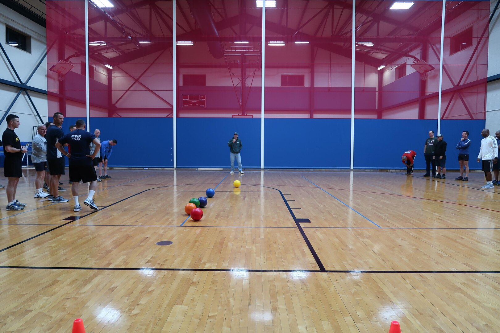 The “East” and “West” teams faced off in an early morning round of dodgeball.