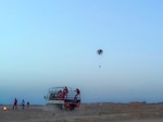 An airdrop of food delivered by the World Food Programme with support from DLA reaches recipients in Syria.