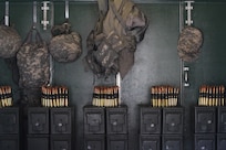 A U.S. Army Reserve range operations Soldiers hang their gear above the prepared ammunition for live-fire qualification during Operation Cold Steel at Fort McCoy, Wis., March 31, 2017. Operation Cold Steel is the U.S. Army Reserve's crew-served weapons qualification and validation exercise to ensure that America's Army Reserve units and Soldiers are trained and ready to deploy on short-notice and bring combat-ready and lethal firepower in support of the Army and our joint partners anywhere in the world. (U.S. Army Reserve photo by Staff Sgt. Debralee Best, 84th Training Command)