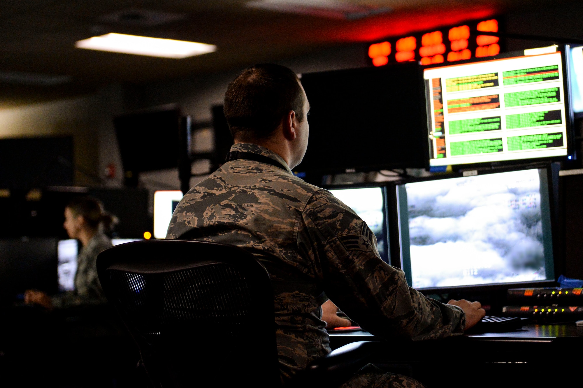 An Airmen from the 480th Intelligence, Surveillance, Reconnaissance Wing perform their jobs at the 480th ISRW at Joint Base Langley-Eustis, Va, Jan 12, 2016. The analytic foundations program requires new analysts to become familiar with the intelligence needs, sources, methods and priorities of the mission prior to entering formal OJT. (U.S. Air Force photo by Senior Airman Nicholas Byers)