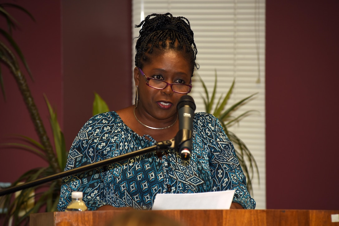 Stephanie Coleman, U.S. Army Corps of Engineers Nashville District Equal Employment and Opportunity Office, reads a poem she wrote to honor Mike Wilson, Nashville District district engineer for Project Management, during his retirement at the Estes Kefauver Federal Building in Nashville, Tenn., March 31, 2017. 