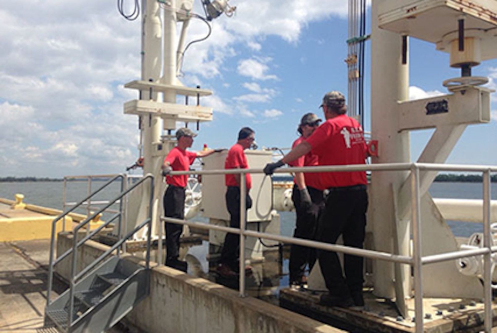 Contractor team members conduct a system walkthrough prior to operations at Defense Fuel Support Point Charleston, South Carolina. The facility recently successfully passed an unannounced worst-case scenario oil spill exercise. Courtesy photo 
