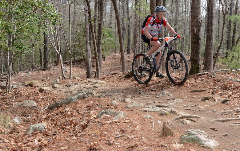 A mountain bicyclist navigates through "The Rock Garden" during the Six Hours of Warrior Creek mountain bike race at the Wilmington District's W. Kerr Scott Dam and Reservoir in Wilkesboro, N.C. (File photo by Hank Heusinkveld) 