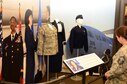 Senior Master Sgt. Audrey Griffon views an exhibit honoring former Mississippi Air National Guard Commander, Major General Catherine Lutz. The display is featured at Camp Shelby&#39;s Armed Forces Museum.