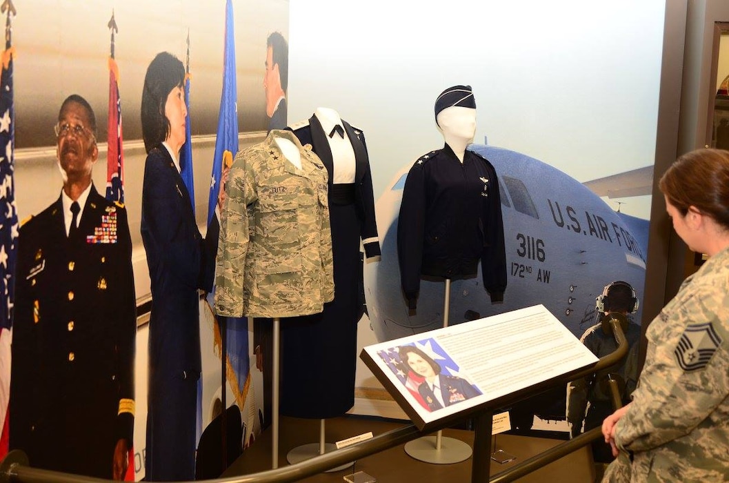 Senior Master Sgt. Audrey Griffon views an exhibit honoring former Mississippi Air National Guard Commander, Major General Catherine Lutz. The display is featured at Camp Shelby's Armed Forces Museum.