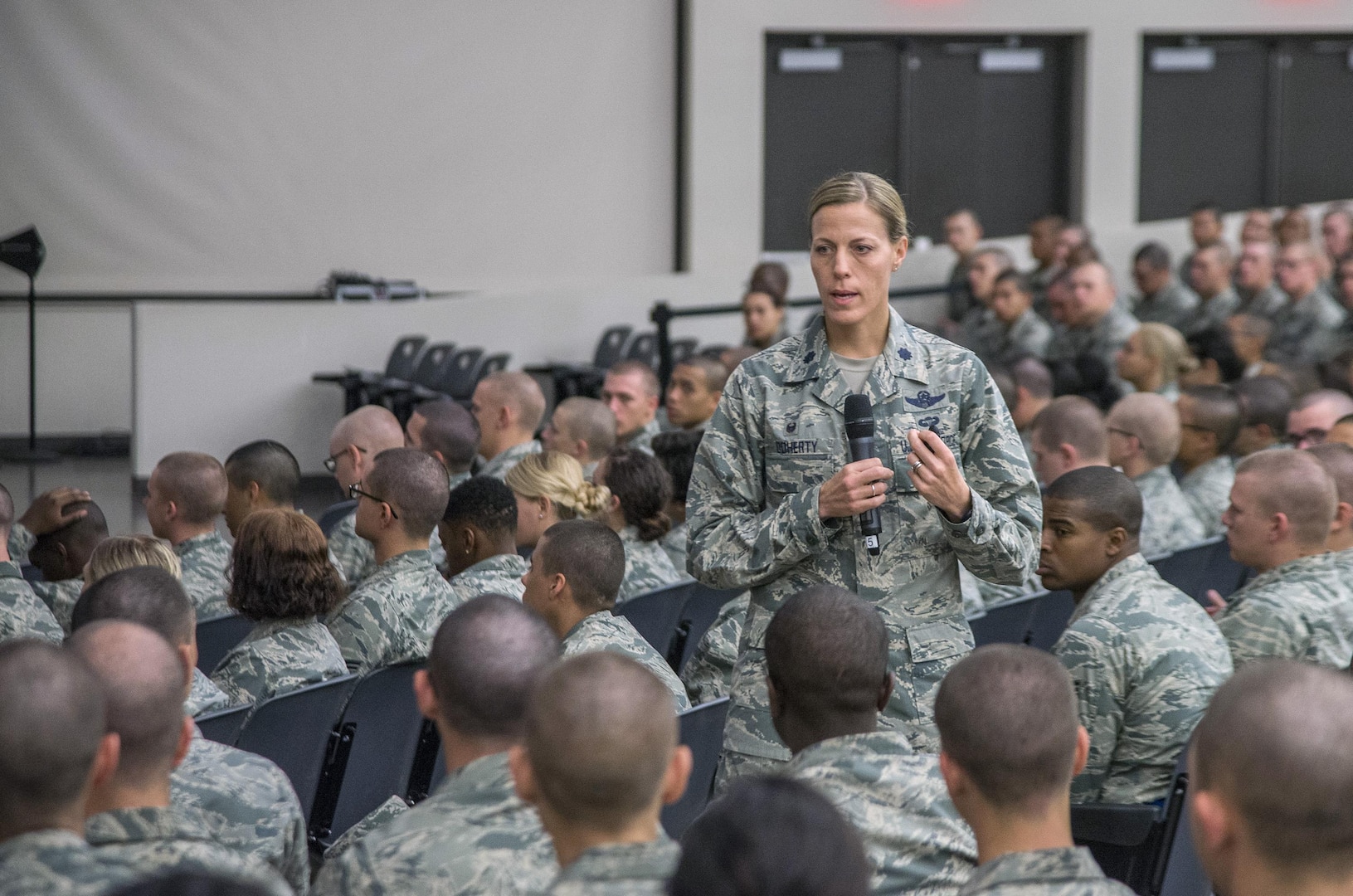Lt. Col Meghan Doherty, 326th Training Squadron commander, addresses Airmen during Airmen’s Week April 3, 2016, at the Pfingston Reception Center at Joint Base San Antonio-Lackland, Texas. Airmen’s Week is a 31-hour, values-based course with a mission to “develop professional, resilient Airmen, inspired by our heritage, committed to the Air Force core values, and motivated to deliver airpower for America.”