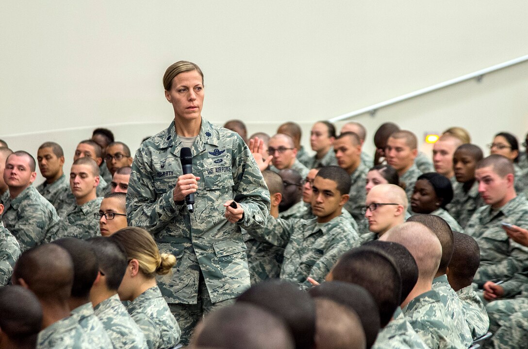 Lt. Col Meghan Doherty, 326th Training Squadron commander, addresses Airmen during Airmen’s Week April 3, 2016, at the Pfingston Reception Center at Joint Base San Antonio-Lackland, Texas. Airmen’s Week is a 31-hour, values-based course with a mission to “develop professional, resilient Airmen, inspired by our heritage, committed to the Air Force core values, and motivated to deliver airpower for America.”