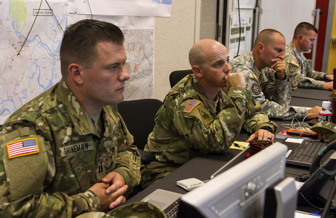 Capt. Christopher Shineman, Capt. Paul Koviuk, Command Sgt. Maj. Fred Waymire and Lt. Col Jack Gray, all with the 317th Military Police Battalion from Tampa, Fla., participate in the Defense Support of Civil Authority (DSCA) training exercise ‘Vigilant Guard’ from March 27 to April 2, 2017 at Fort Stewart, Ga. The training scenario required U.S Army Reserve and National Guard troops to respond to a category 3 hurricane. (U.S. Army Reserve photo by Sgt. Elizabeth Taylor)