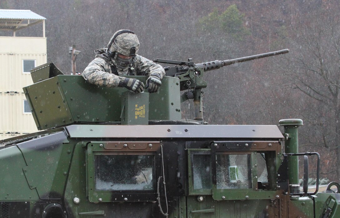 U.S. Army Reserve Sgt. Phillip McCaffrey, 238th Transportation Company (Improved Cargo Handling Operations), 79th Sustainment Support Command, opens an ammunition can in preparation for qualification live-fire during Operation Cold Steel at Fort McCoy, Wis., April 3, 2017. Operation Cold Steel is the U.S. Army Reserve's crew-served weapons qualification and validation exercise to ensure that America's Army Reserve units and Soldiers are trained and ready to deploy on short-notice and bring combat-ready and lethal firepower in support of the Army and our joint partners anywhere in the world. (U.S. Army Reserve photo by Staff Sgt. Debralee Best, 84th Training Command)